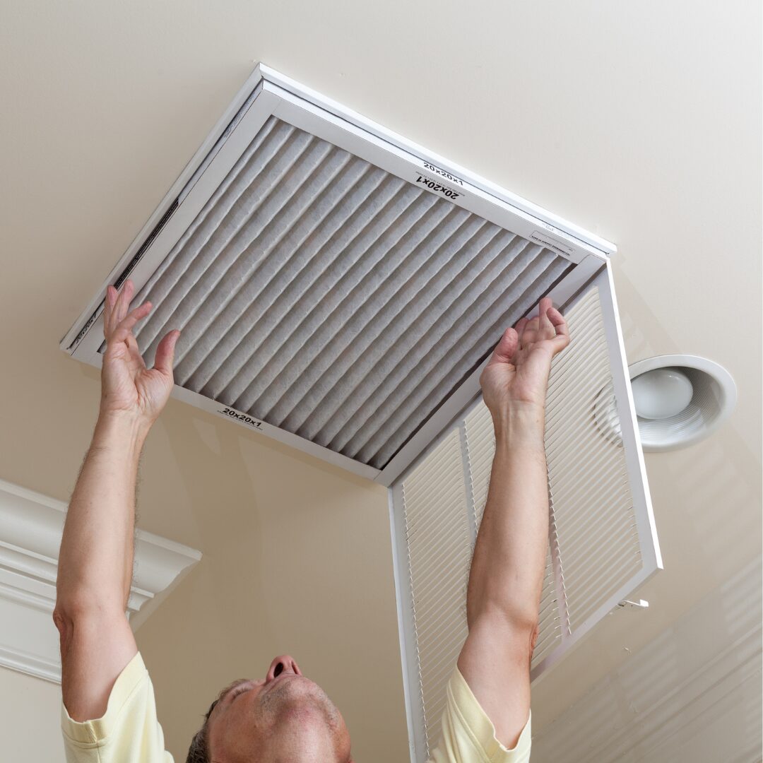 Malek technician evaluating residential HVAC filtration