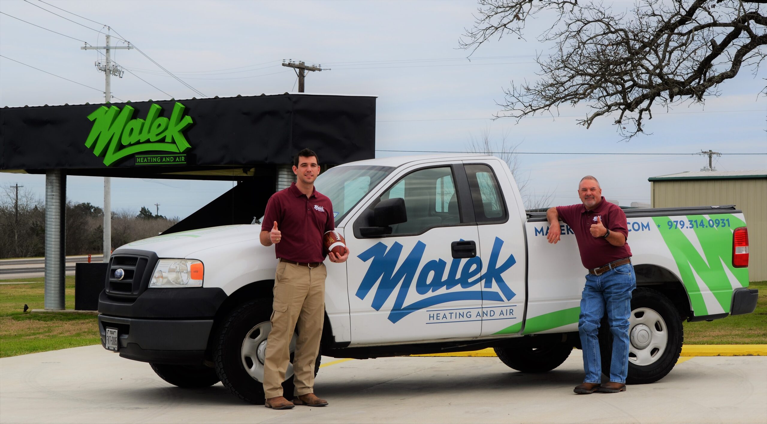 Malek leaders and longtime team members together