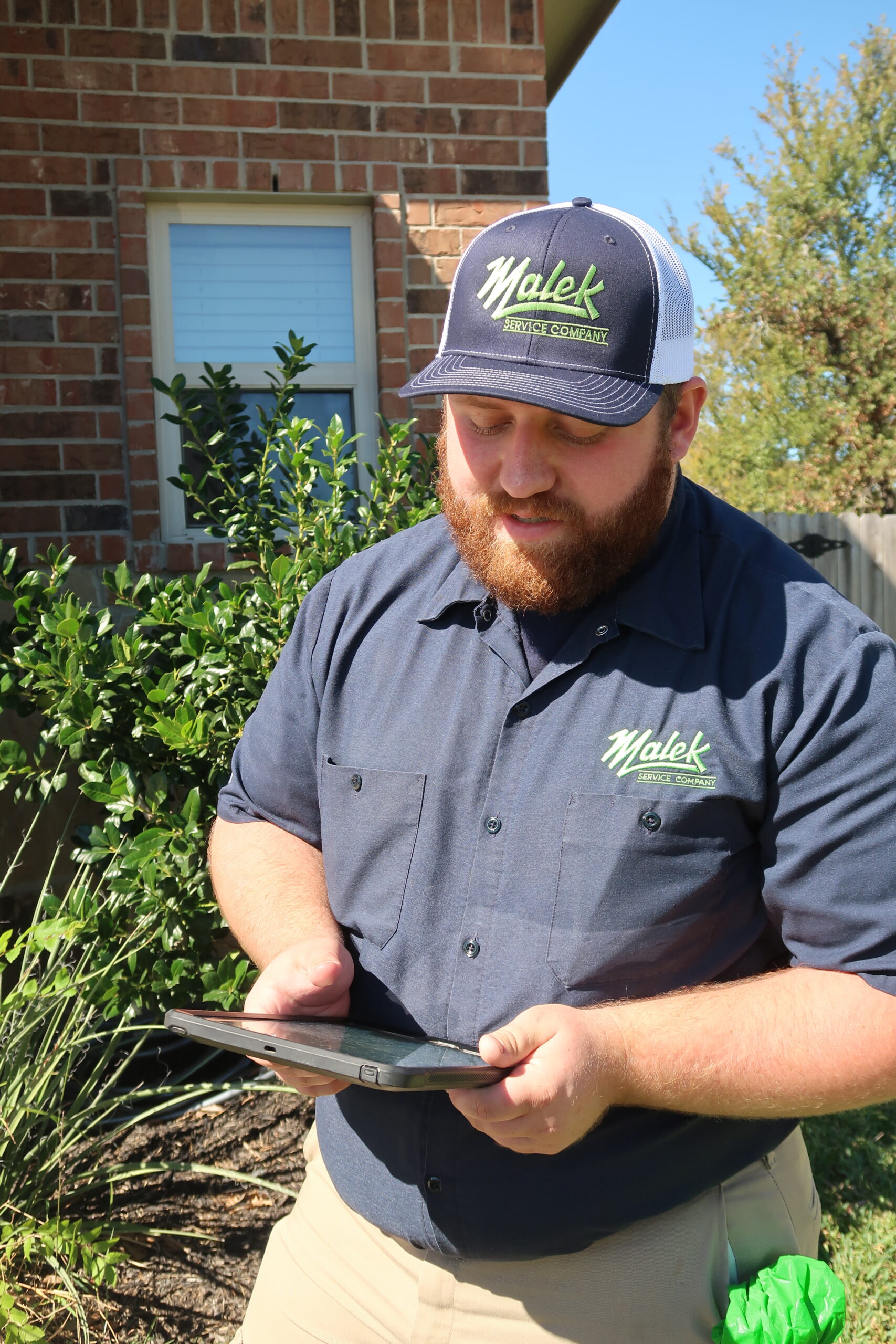 Homeowner learning about the cost of a home service investment