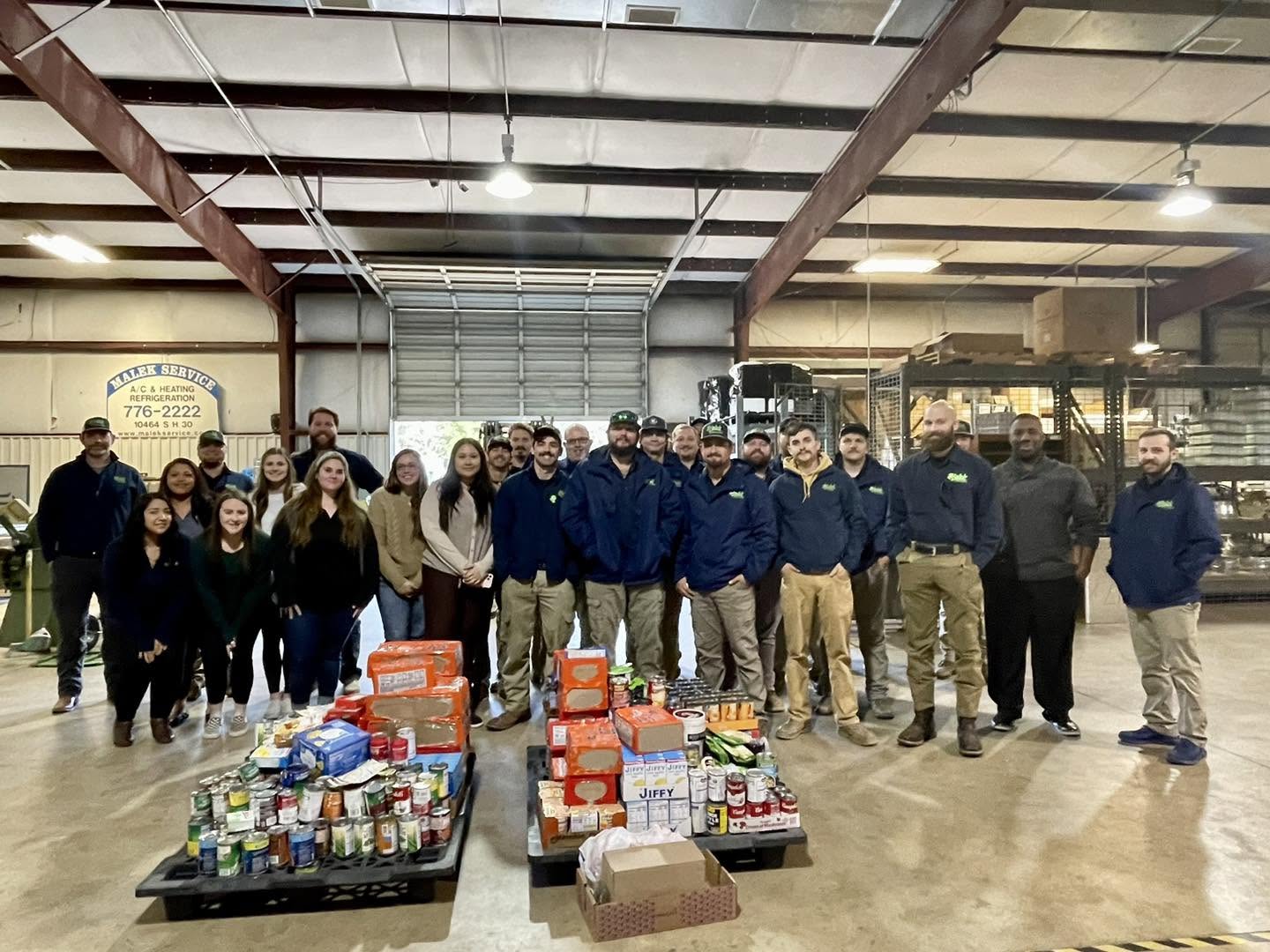 Malek Service Company team supporting a local food drive