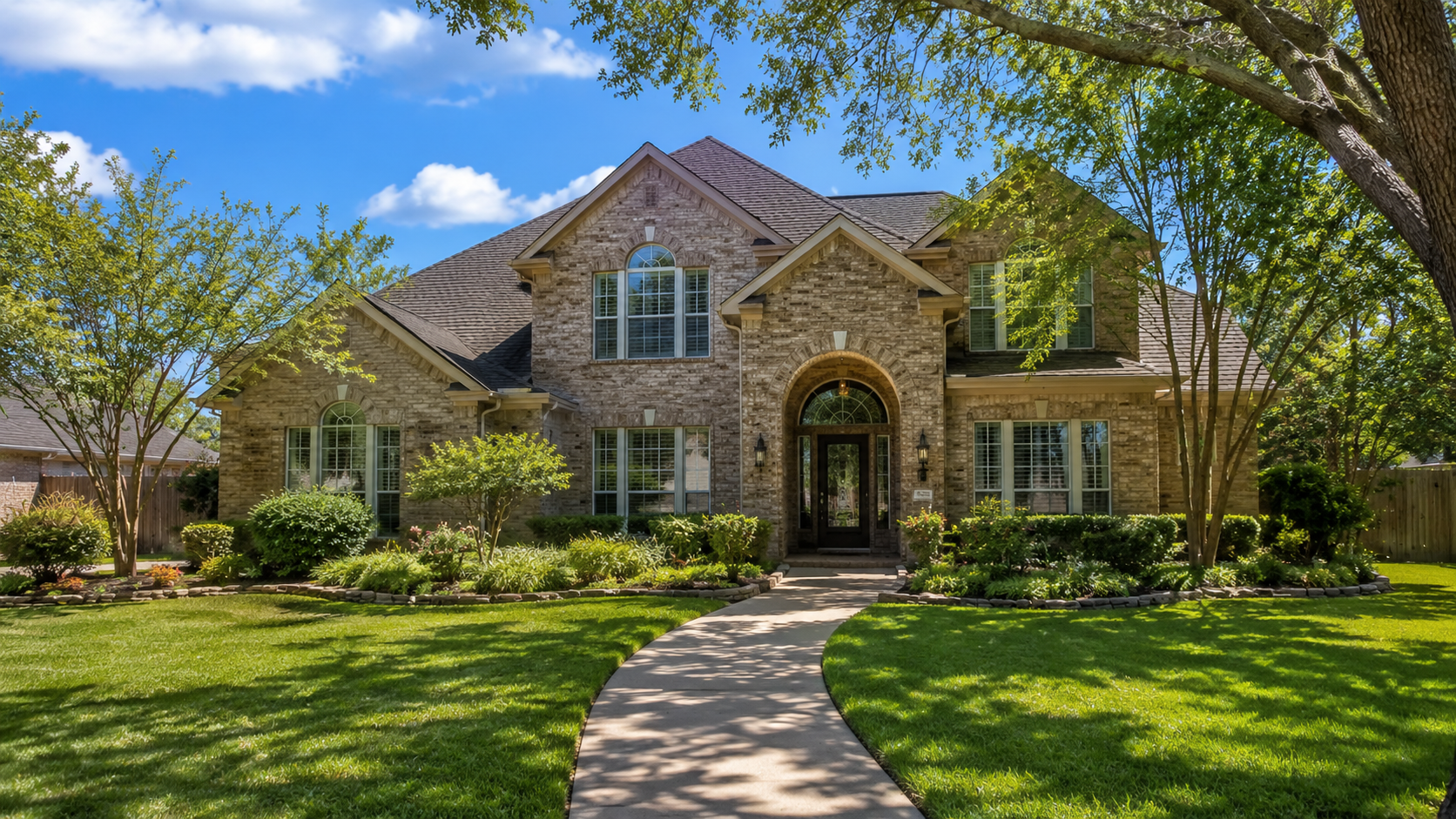 Tree-lined residential home representing Jersey Village, Texas