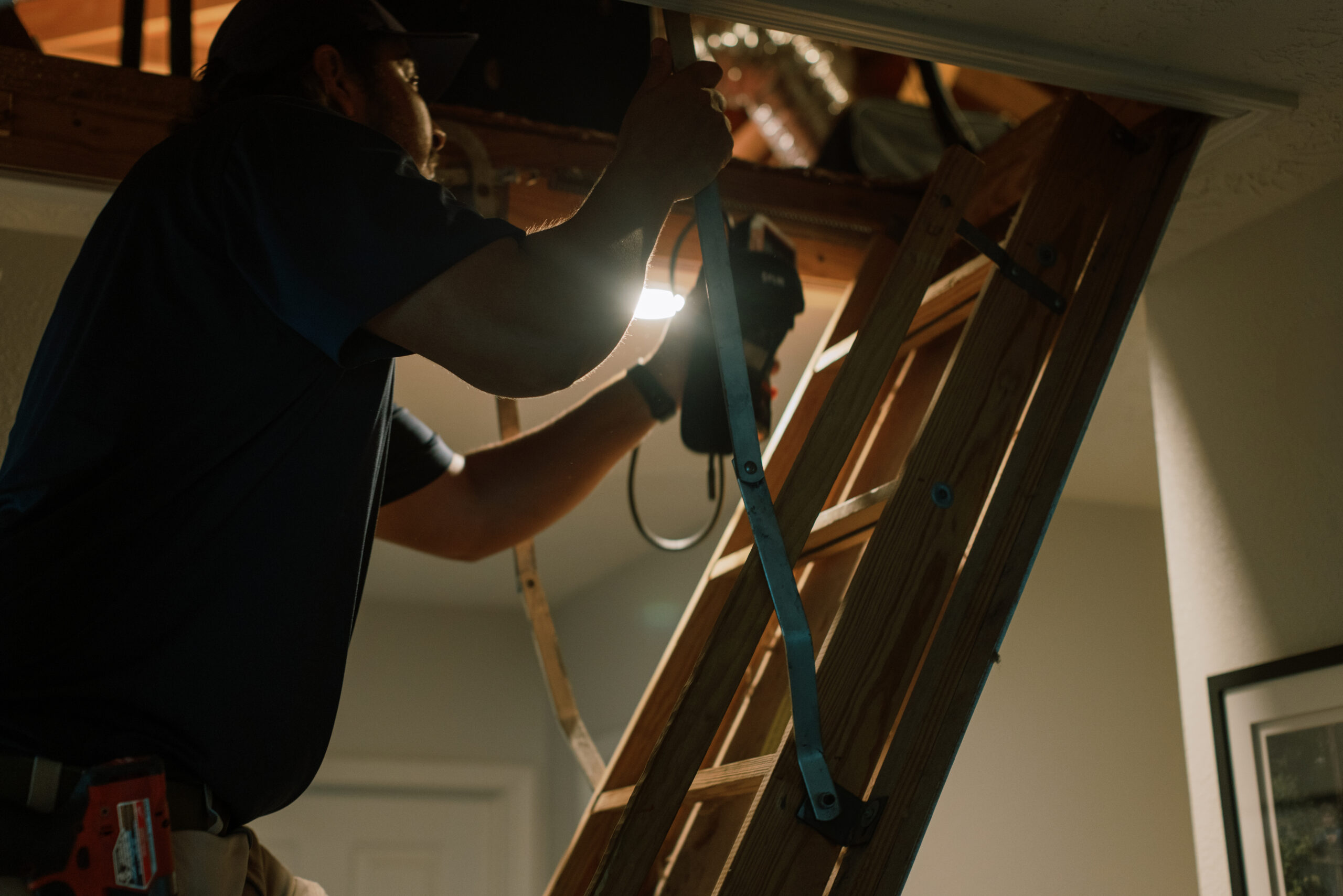 Malek HVAC technician evaluating residential heating equipment
